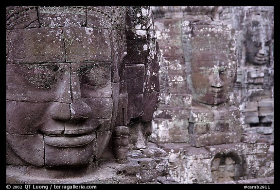 Serene and massive stone faces, the Bayon. Angkor, Cambodia (color)