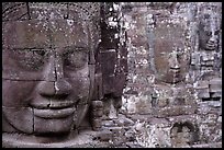 Serene and massive stone faces, the Bayon. Angkor, Cambodia ( color)