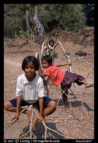 Kids playing, the Bayon. Angkor, Cambodia (color)