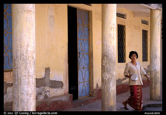 Woman in downtown building. Phnom Penh, Cambodia