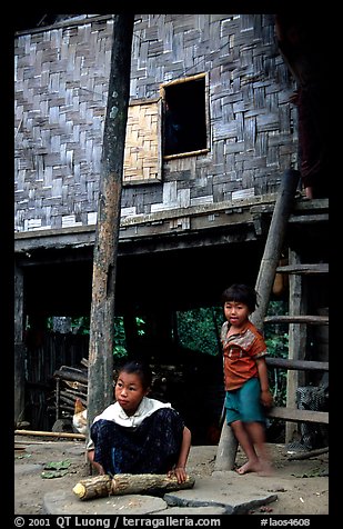 Children near stilt house of a small hamlet. Mekong river, Laos