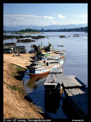Slow passenger boats in Huay Xai. Mekong river, Laos (color)