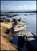 Slow passenger boats in Huay Xai. Mekong river, Laos (color)