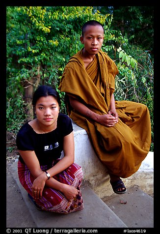 Buddhist novice monk and his sister. Luang Prabang, Laos