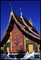 Rear of the Sim of Wat Xieng Thong with mosaic of the tree of life. Luang Prabang, Laos