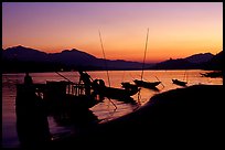 Boats, sunset on the Mekong river. Luang Prabang, Laos ( color)