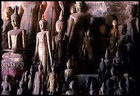 Lao style Buddha sculptures assembled over the centuries by local people, Pak Ou. Laos