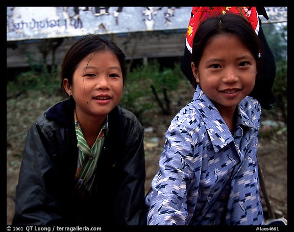Two young girls at the market. Luang Prabang, Laos