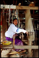Traditional weaving in Ban Phanom village. Luang Prabang, Laos (color)