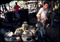 Making of the Lao Lao, strong local liquor in Ban Xang Hai village. Laos