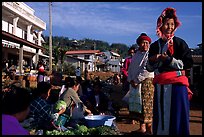 Women in tribal clothes at the Huay Xai market. Laos (color)