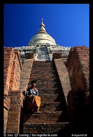 On steps of Shwesandaw Paya's upper terraces. Bagan, Myanmar (color)