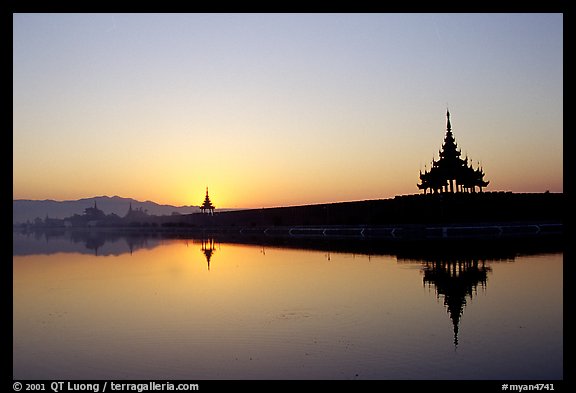 Sunrise on the Mandalay Fort moats. Mandalay, Myanmar (color)