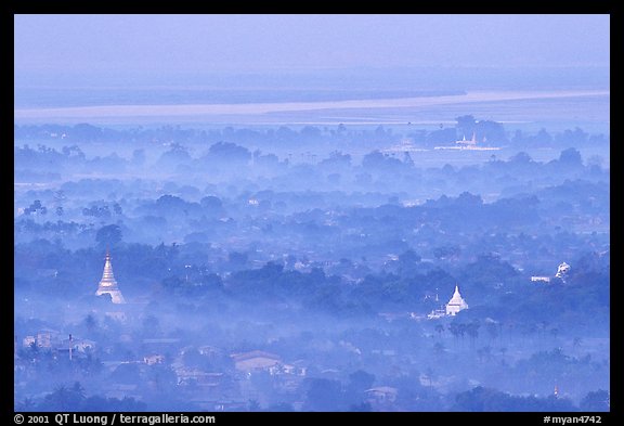 View from the hill through dawn mist. Mandalay, Myanmar (color)