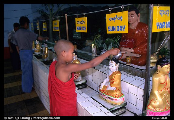 Novice offering Water at  Mahamuni Paya. Mandalay, Myanmar (color)