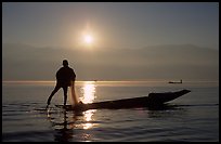Intha fisherman, sunrise. Inle Lake, Myanmar ( color)