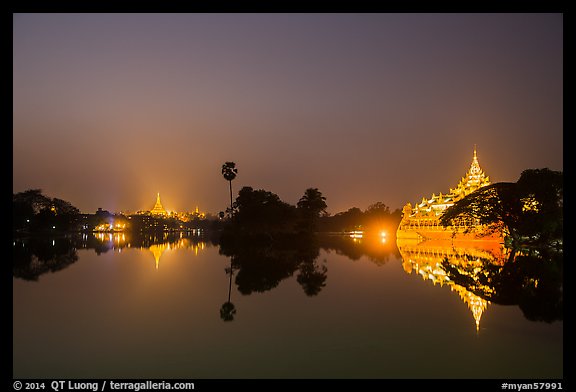 Shwedagon Pagoda and Karawek Hall reflected in Kandawgyi Lake. Yangon, Myanmar