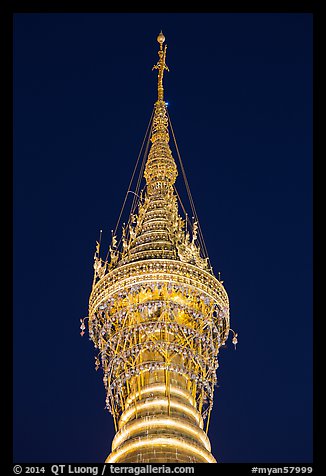 Hti of the Shwedagon Pagoda, adorned with thousands of gems and golden bells. Yangon, Myanmar (color)