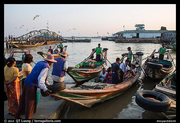 Passengers on oared water taxi crossing Yangon River. Yangon, Myanmar