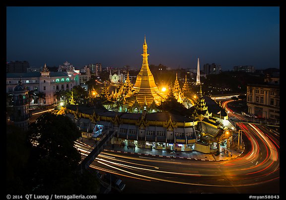 Traffic circle around Sule Pagoda at dusk. Yangon, Myanmar (color)