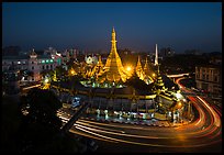 Traffic circle around Sule Pagoda at dusk. Yangon, Myanmar ( color)