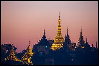 Distant view of Naungdawgyi Pagoda and shrines at dawn. Yangon, Myanmar ( color)