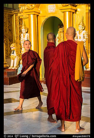 Monks on platform, Shwedagon Pagoda. Yangon, Myanmar