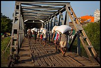 Workers unload bags of rice, Sinodan pier. Yangon, Myanmar ( color)