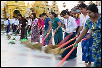 Row of women sweeping, Shwedagon Pagoda. Yangon, Myanmar ( color)