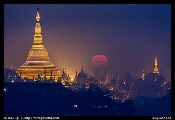 Moonset over Shwedagon Pagoda. Yangon, Myanmar