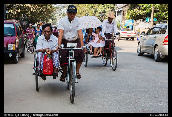 Trishaws on street. Yangon, Myanmar (color)