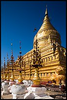 Umbrellas and main stupa, Shwezigon Pagoda. Bagan, Myanmar ( color)