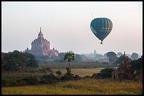 Hot air ballon and Thatbyinnyu temple. Bagan, Myanmar ( color)