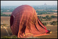 Aerial view of landed hot air balloon. Bagan, Myanmar ( color)