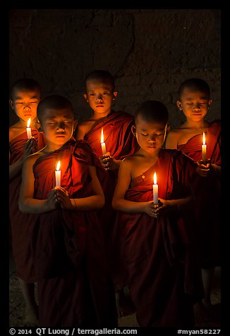 Group of buddhist novices holding candles. Bagan, Myanmar (color)