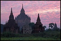 Temples profiled against brilliant sunrise sky. Bagan, Myanmar ( color)