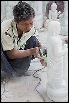 Stone sculptor finishing buddha statue. Mandalay, Myanmar ( color)