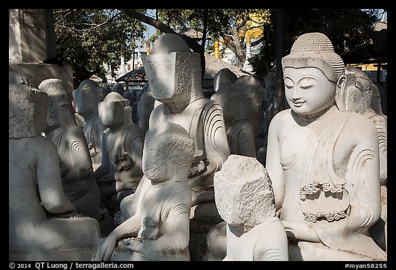 Buddha statues in various stages of completion on Marble street. Mandalay, Myanmar (color)