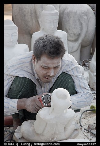 Sculptor with face covered in fine marble dust. Mandalay, Myanmar (color)