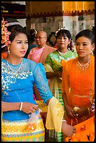 Women wearing their best dress for Shinbyu ceremony, Mahamuni Pagoda. Mandalay, Myanmar ( color)