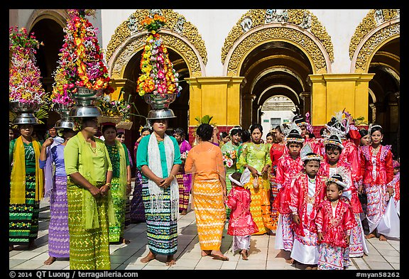 Young children and families gathering for noviciation ceremony, Mahamuni Pagoda. Mandalay, Myanmar (color)