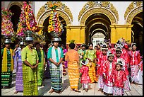 Young children and families gathering for noviciation ceremony, Mahamuni Pagoda. Mandalay, Myanmar ( color)