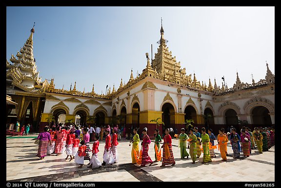 Novices and families walk in procession during Shinbyu ceremony, Mahamuni Pagoda. Mandalay, Myanmar (color)