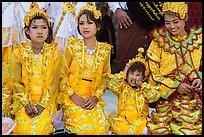 Girls with make-up and princely attire reacting during Noviciation, Mahamuni Pagoda. Mandalay, Myanmar ( color)
