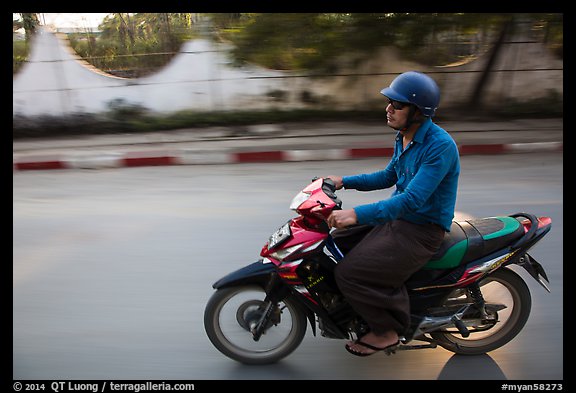 Motorcyle rider. Mandalay, Myanmar (color)