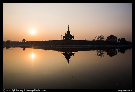 Sunrise, Mandalay Fort moat. Mandalay, Myanmar (color)