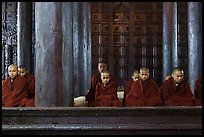 Monks during evening prayer. Mandalay, Myanmar ( color)