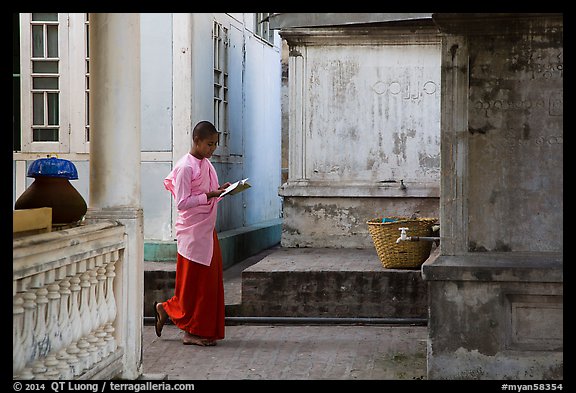 Nun reading, Zayar Theingi Nunnery, Sagaing. Myanmar (color)