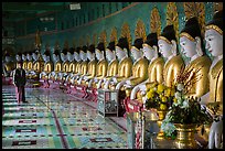 Buddha images in crescent-shaped hall, U Min Thonze pagoda, Sagaing. Myanmar ( color)