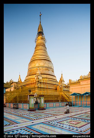 Man praying at main stupa of Soon U Ponya Shin Pagoda. Myanmar (color)